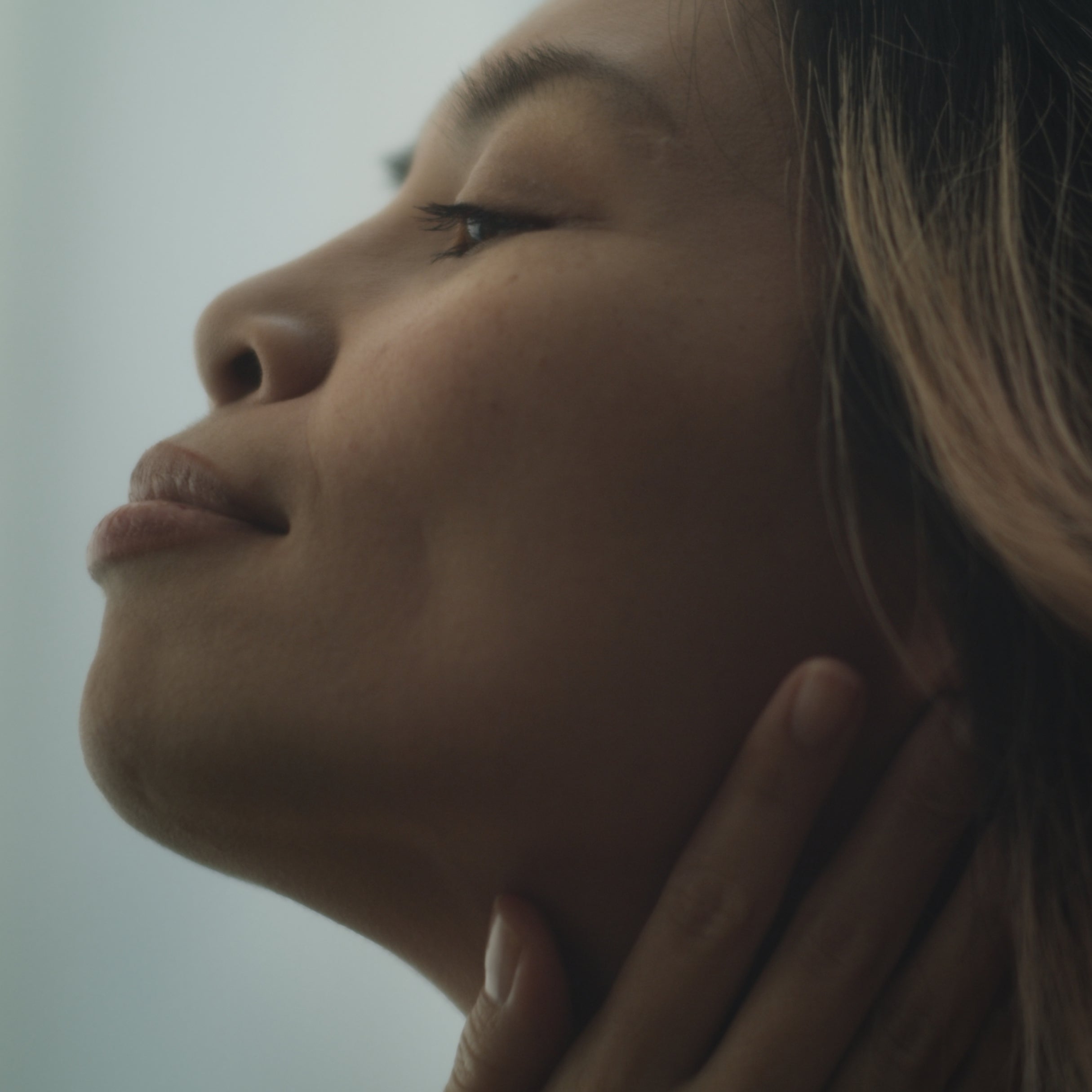A close-up profile of a woman .